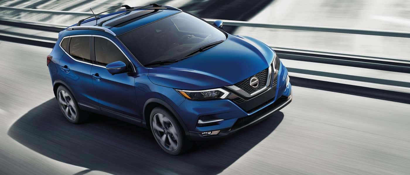 Blue 2020 Nissan Rogue Sport on highway
