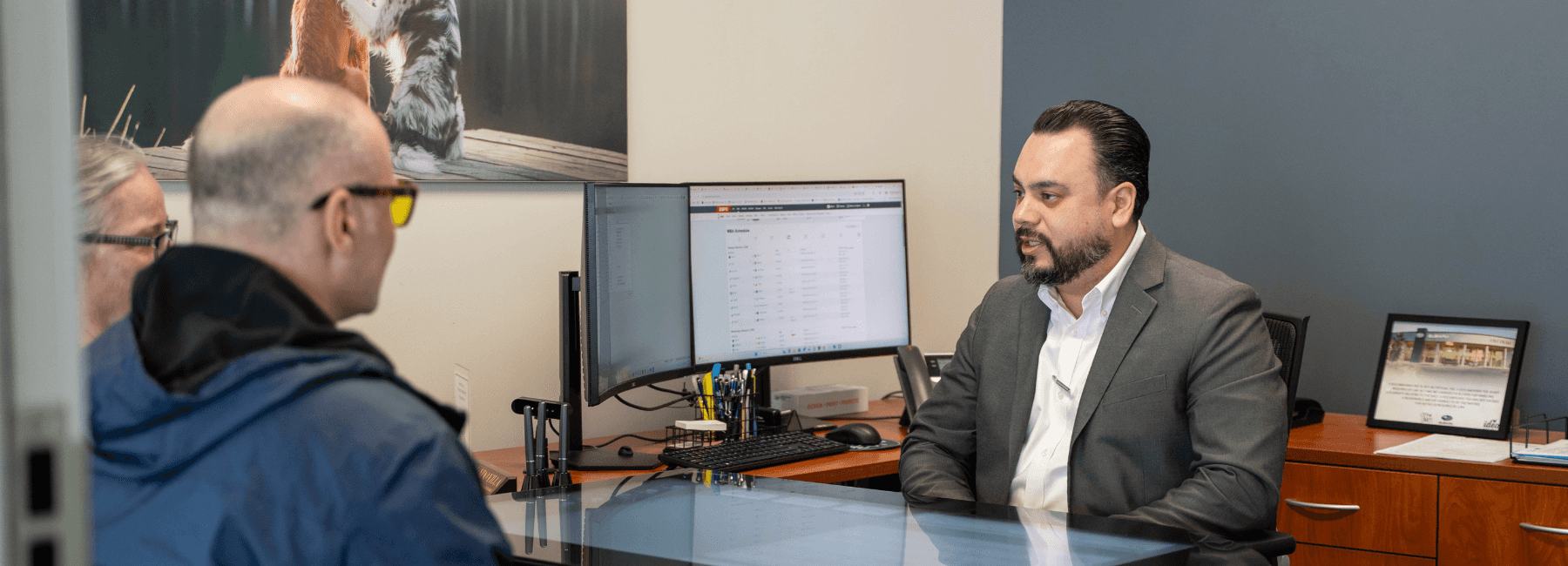 Two men sitting at desk