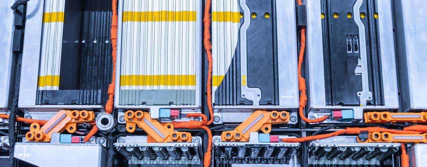 A close up shows the battery bank in a Chevy EV.
