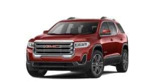 A red 2022 GMC Acadia is angled left.
