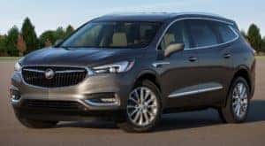A brown 2018 Buick Enclave is shown from the side after leaving a Louisville used Buick dealer.