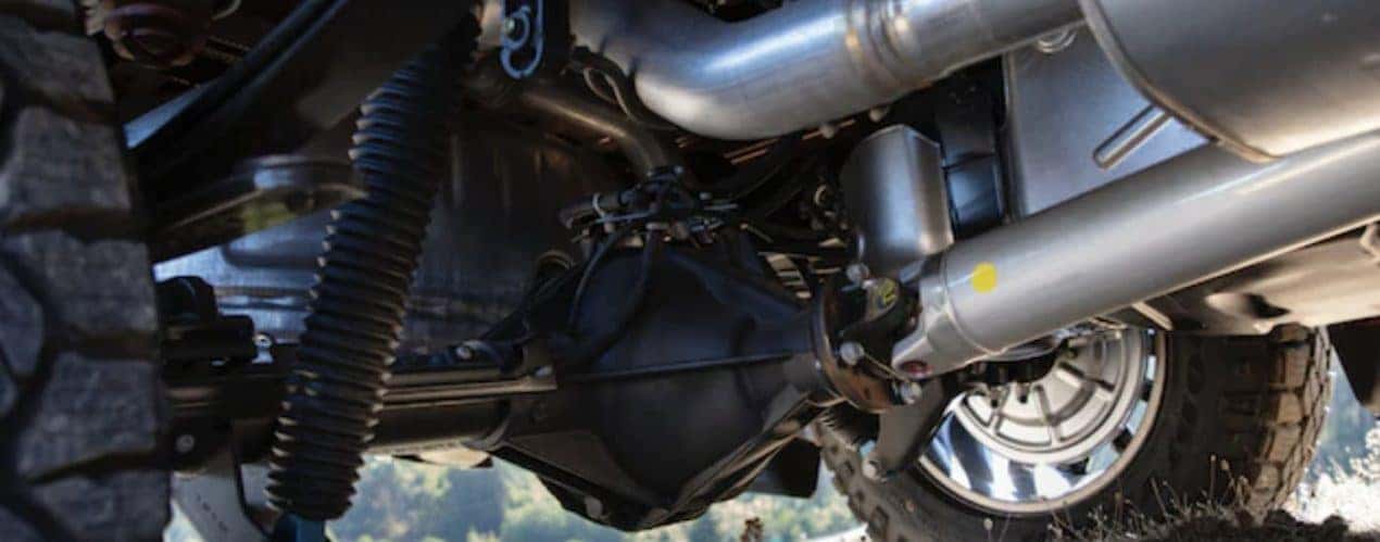 The underside of a 2022 GMC Sierra 1500 is shown in close up.