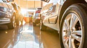 A Louisville used car dealer shows the gallery from a low angle.