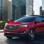 2019 Ford Edge Titanium driving through city
