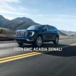 2024 GMC Acadia Denali Driving with Mountains in the Background