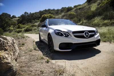 White Mercedes-Benz in Desert