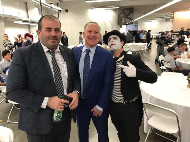 Mime and Fletcher Jones Team at Caliber Collision Holiday Luncheon