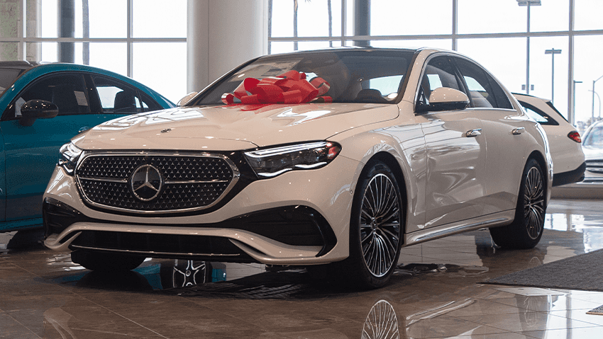 2024 White Mercedes-Benz E-Class Sedan Exterior with red bow