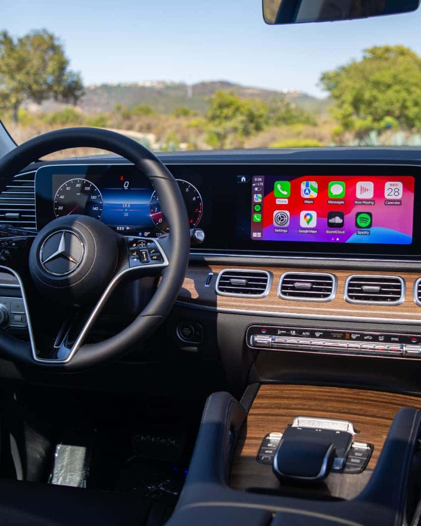 2026 GLE 450e SUV user-friendly digital cockpit with MBUX floating dashboard and 64-color LED ambient lighting