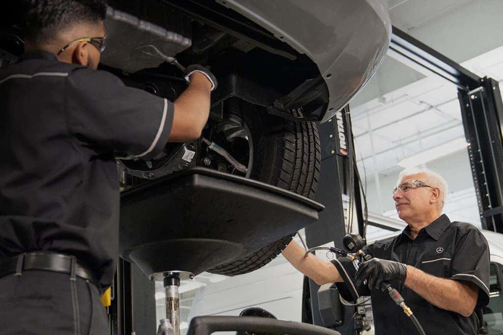 Technicians Servicing Van