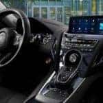 2019 Acura RDX Interior wheel and console with sunny city view outside