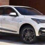 White 2020 Acura RDX exterior white on sunny driveway