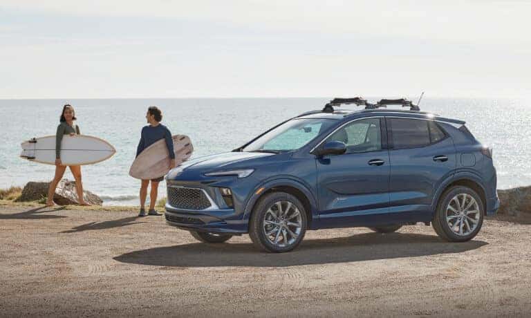 2024 Buick Encore GX exterior beach with surfers