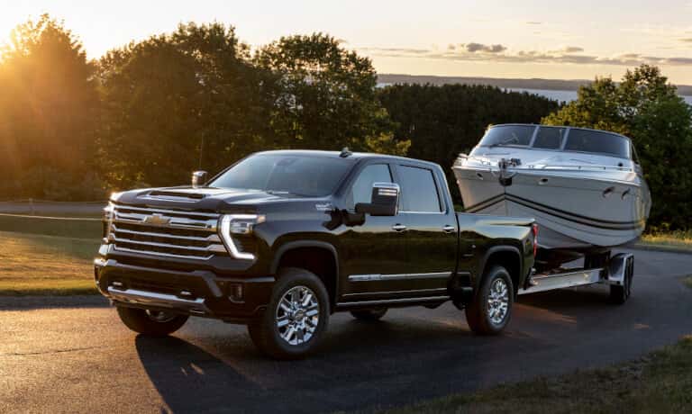 2026 Chevy Silverado 2500 HD towing a boat