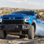 2025 Chevy Silverado 1500 driving across rough terrain