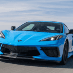 A blue Chevy Corvette on the road