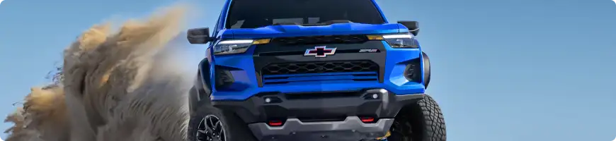 Chevrolet Colorado towing a boat trailer