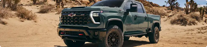 Chevrolet Silverado 2500HD towing a heavy boat trailer