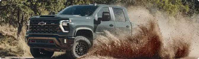 2026 Chevrolet Silverado 2500HD Duramax and 2026 Ram 2500 Cummins engines