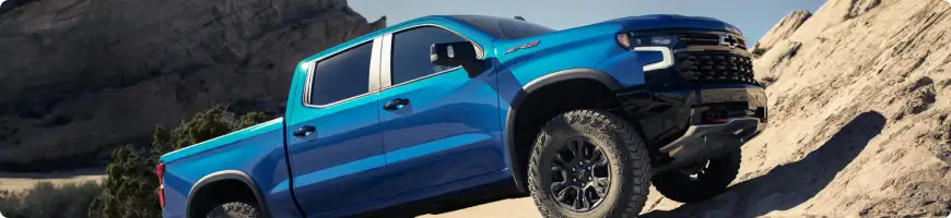 2026 Chevrolet Silverado Custom Trail Boss compared with the LT Trail Boss