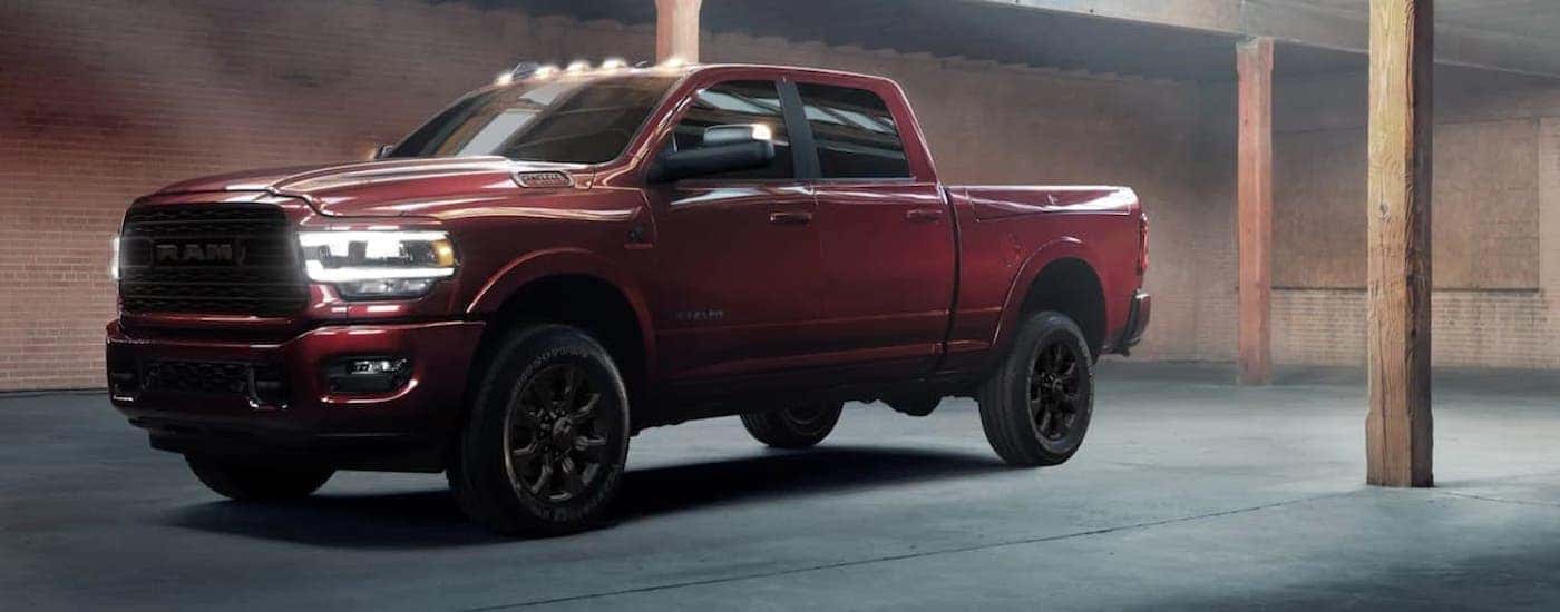 Red 2021 Ram 2500 parked in a garage.