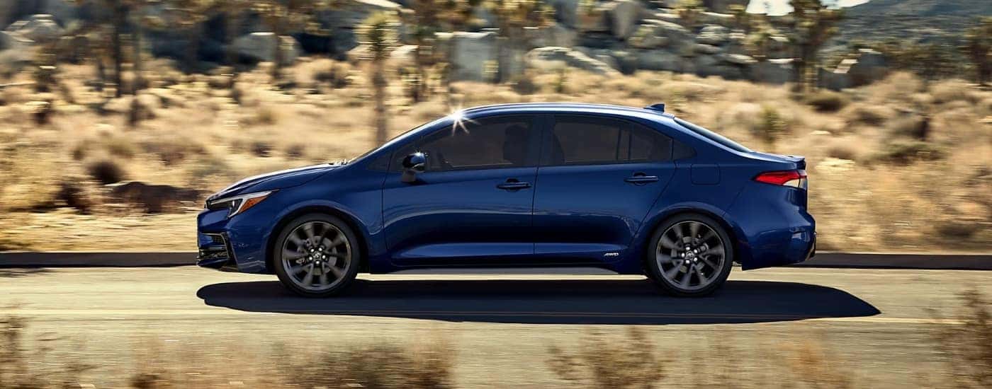 A blue 2024 Toyota Corolla from the side.