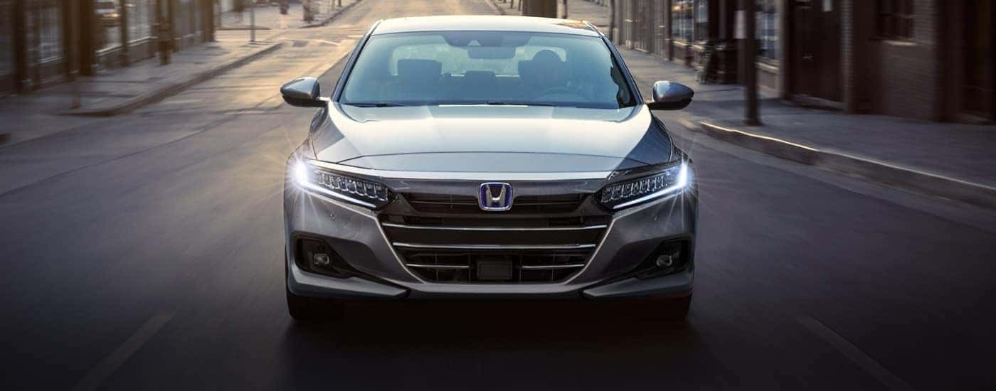 A silver 2022 Honda Accord shown driving from front.
