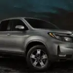 2026 Honda Ridgeline near Smithtown, NY parked under a night sky, showing a capable midsize pickup ready for outdoor adventures.