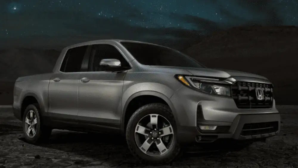 2026 Honda Ridgeline near Smithtown, NY parked under a night sky, showing a capable midsize pickup ready for outdoor adventures.