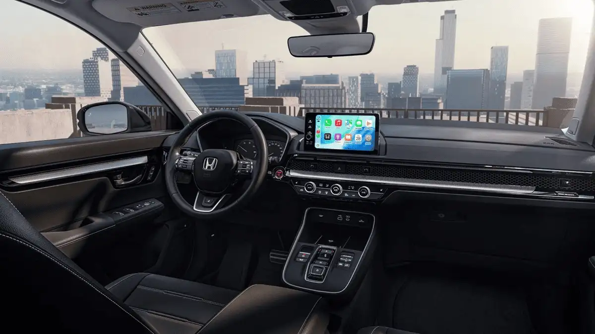 2026 Honda CR-V e:FCEV near Smithtown, NY interior dashboard view with touchscreen display, steering wheel controls, and city skyline