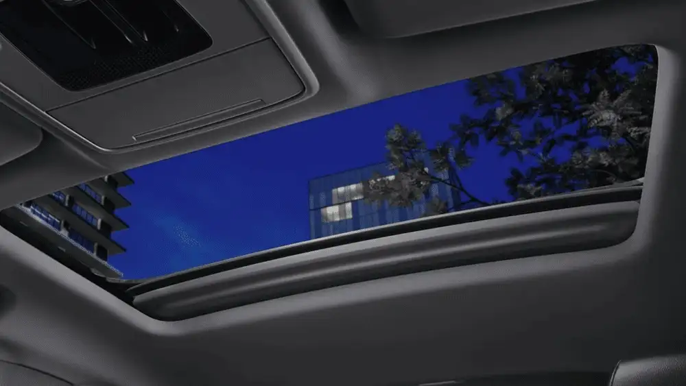 2026 Honda Accord Hybrid panoramic moonroof interior view with blue sky and trees near Commack NY