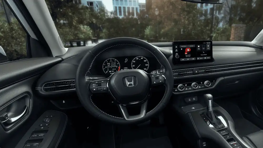2026 Honda HR-V interior cockpit with Honda steering wheel and digital instrument cluster near Commack NY