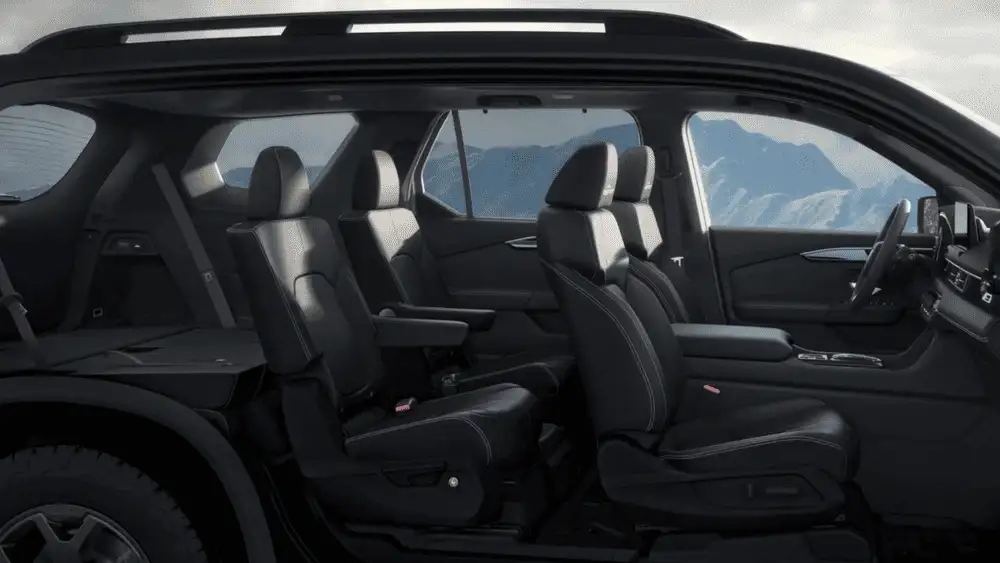 2025 Honda Pilot three-row black leather seating interior with panoramic roof view near Commack NY
