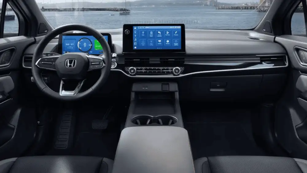 2026 Honda Prologue electric SUV interior with dual digital displays and Honda steering wheel near Commack NY