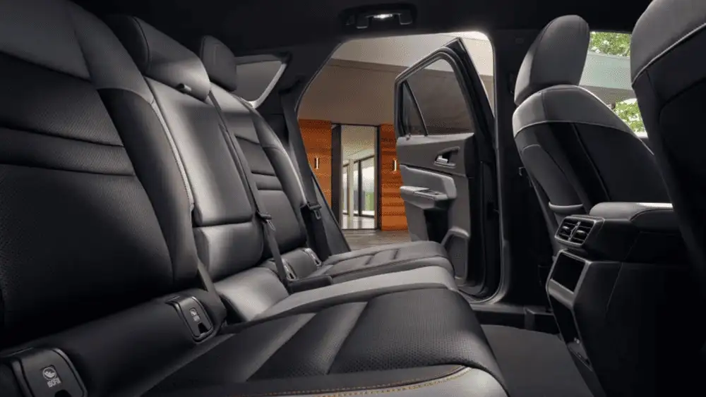 2026 Honda Prologue spacious black leather rear passenger seating with open door view near Commack NY