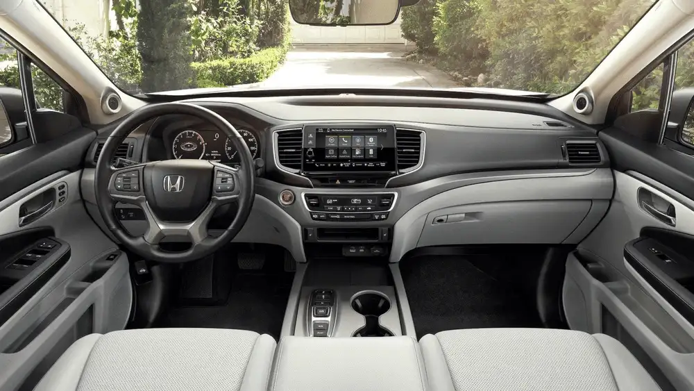 2026 Honda Ridgeline interior dashboard with Honda steering wheel and touchscreen infotainment near Commack NY