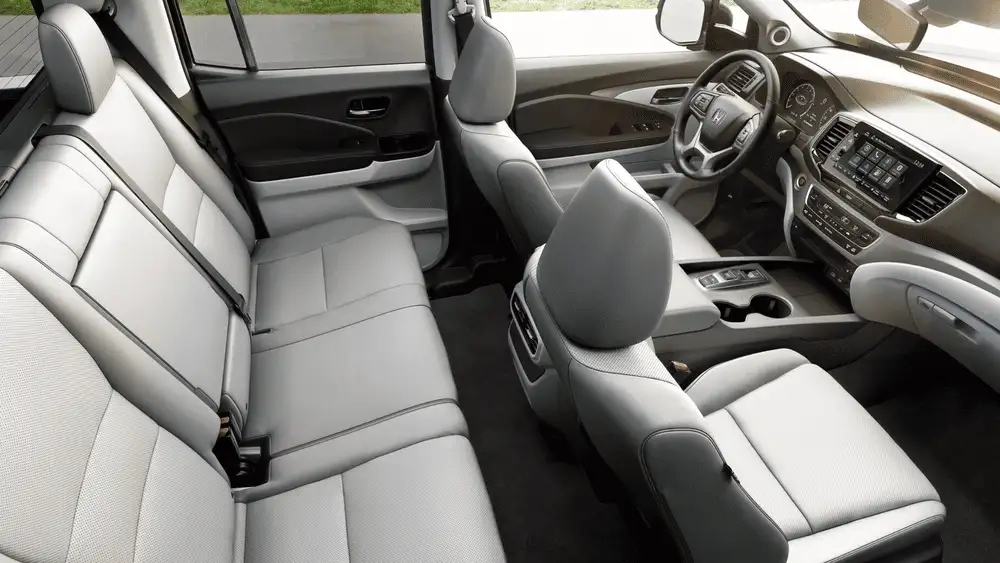 2026 Honda Ridgeline gray leather front and rear cabin seating interior side view near Commack NY