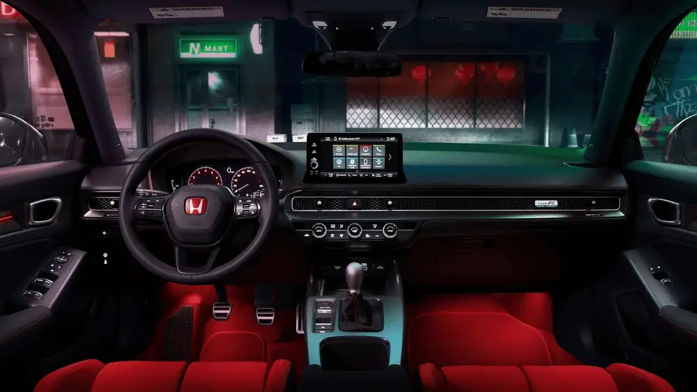 2025 Honda Civic Type R full cockpit view with red interior ambient lighting Honda steering wheel and touchscreen