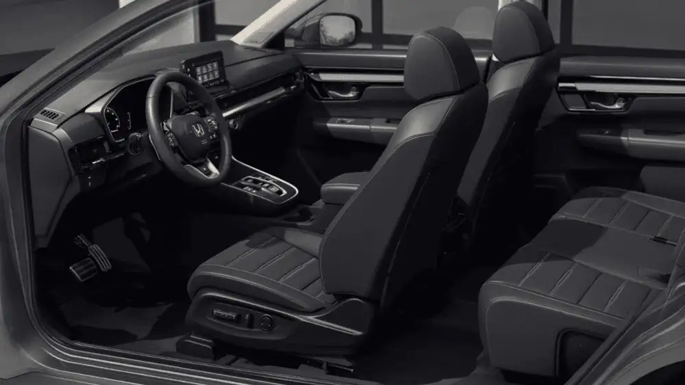 2026 Honda CR-V e:FCEV black leather front and rear seat interior side view with Honda steering wheel