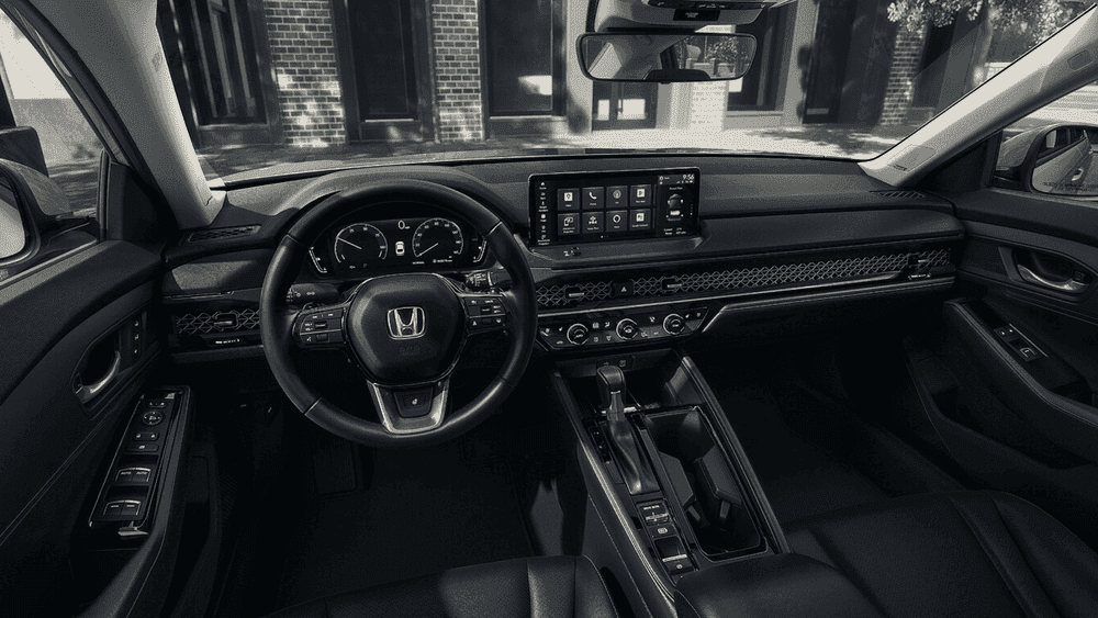 2026 Honda Accord interior dashboard showing the Honda steering wheel and wide touchscreen display near Hauppauge NY