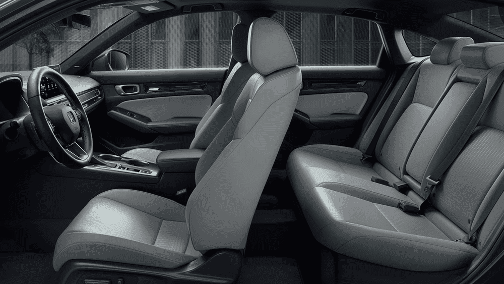 2026 Honda Civic Sedan gray cloth front and rear seats viewed from the side near Hauppauge NY