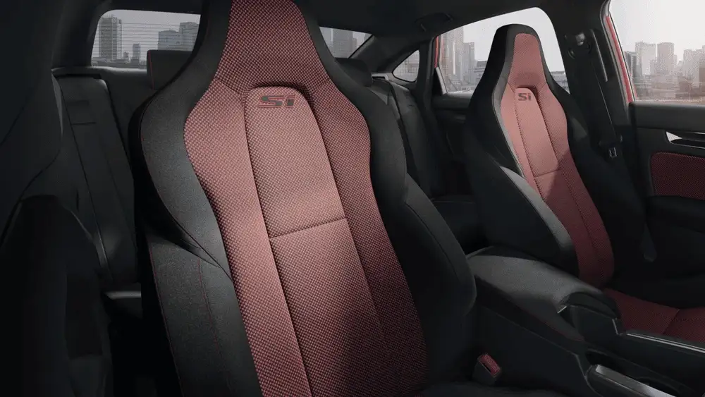 Red and black sport seats inside a 2026 Honda Civic Si near Hauppauge, NY.