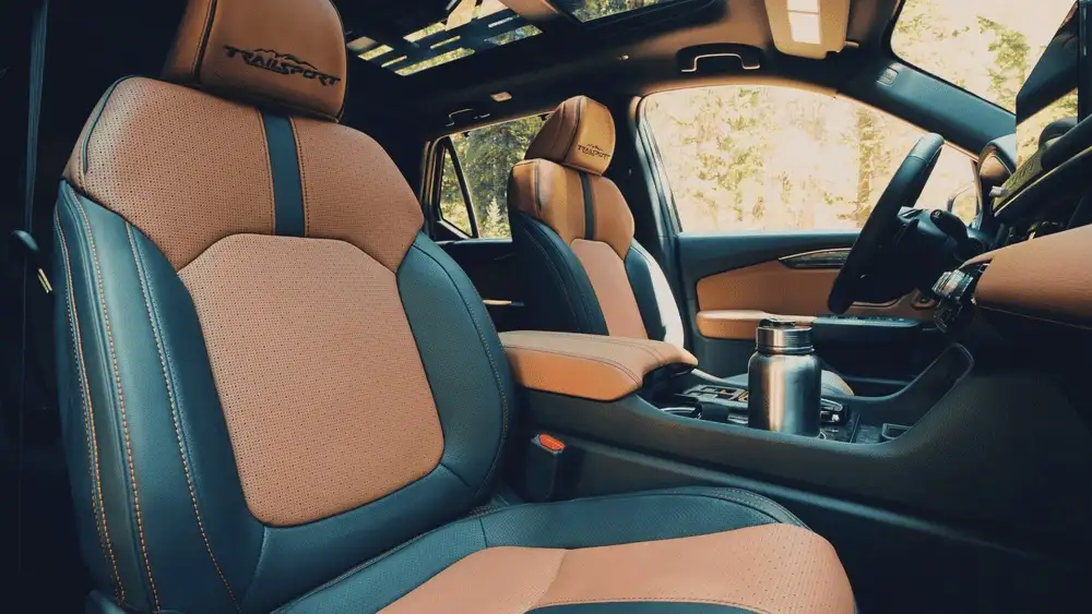 Tan and black TrailSport seats inside a 2026 Honda Passport near Hauppauge, NY.