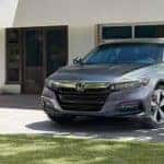 Honda Accord in front of house