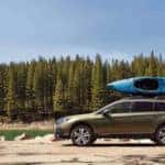 Outback 2.5i Limited parked near lake