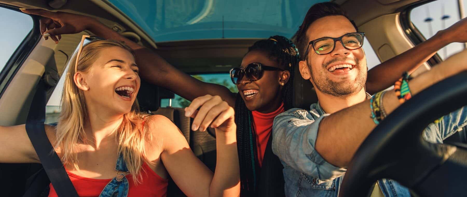 Friends having fun car ride