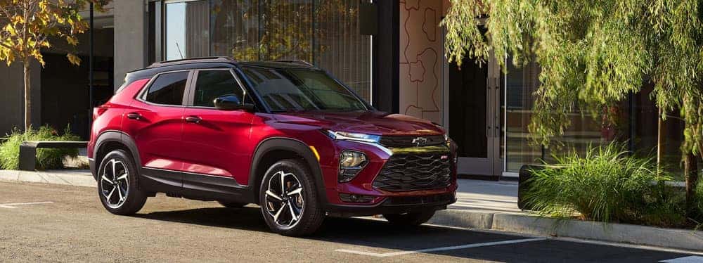 red chevrolet blazer parks outside the best dealership