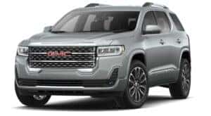 A silver 2021 GMC Acadia Denali is angled left.