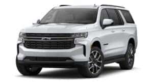 A white 2021 Chevy Suburban RST is angled left.
