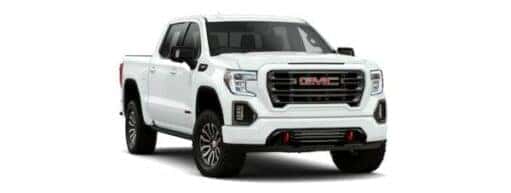 A white 2021 GMC Sierra 1500 AT4 is angled right.